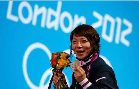 日本奥运选手拍卖私人物品用于灾区重建(图)_